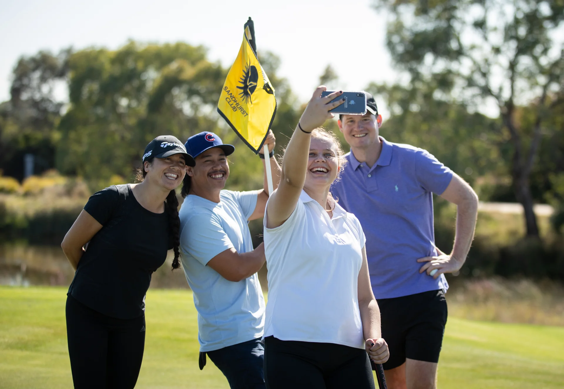 A group of friends on the golf course.