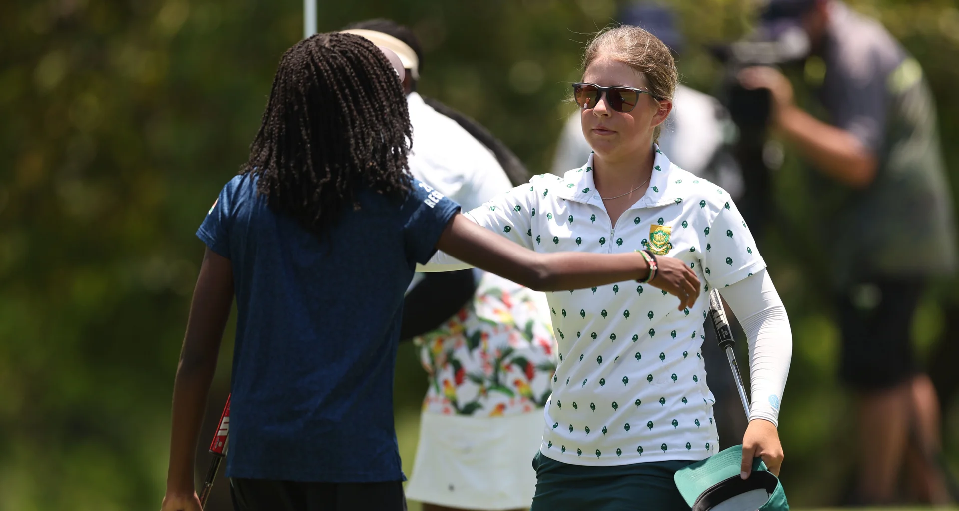 Lisa Coetzer of South Africa reacts to Kanana Muthomi of Kenya during Day Two of the Africa Amateur Women's Invitational at Royal Johannesburg 