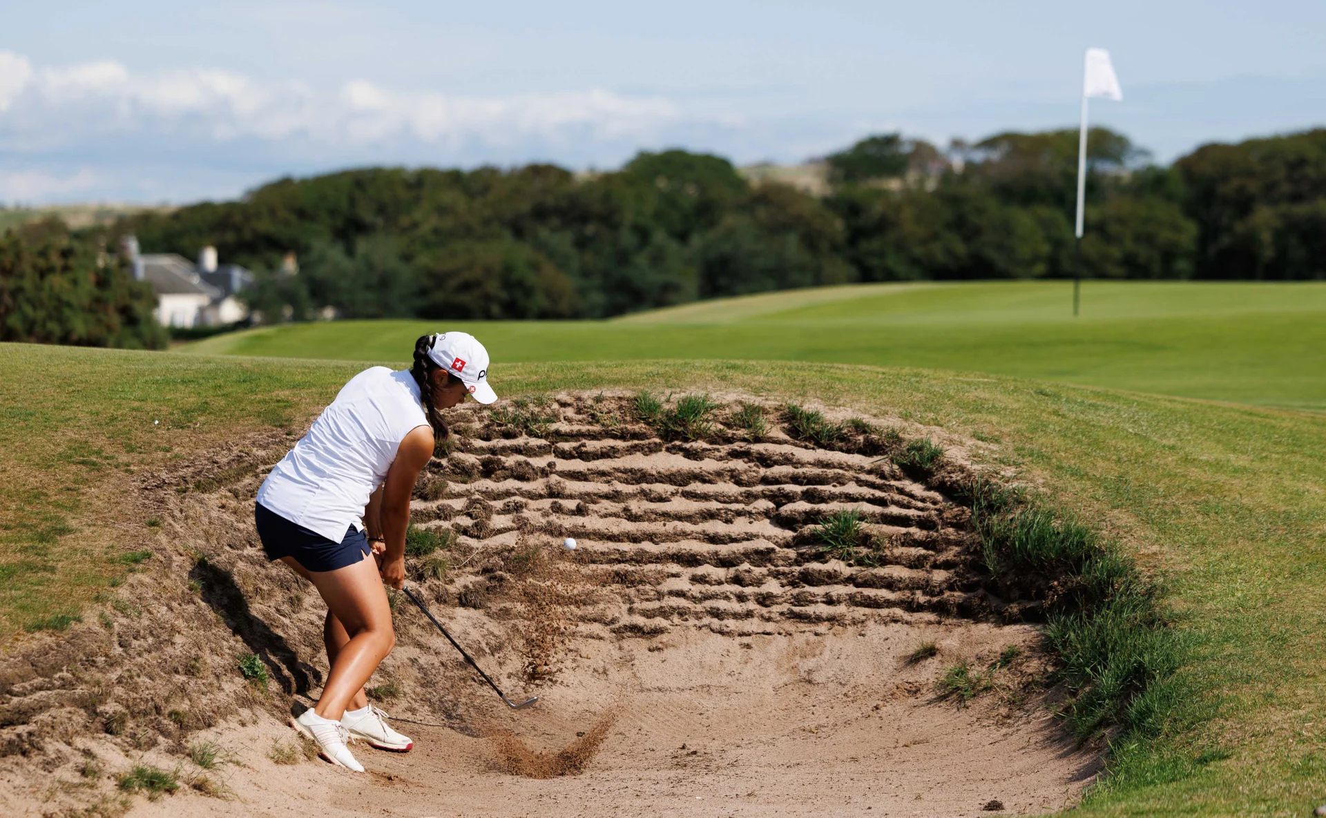 Lana Guyot of Switzerland plays a bunker shot during Day Five of the R&A Girls' Amateur Championship at Craigielaw.