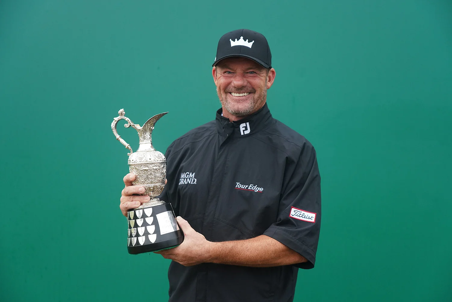 Alexander Cjeka of Germany poses with the winners trophy during Day Four of The Senior Open Presented by Rolex at Royal Porthcawl Golf Club on July 30, 2023