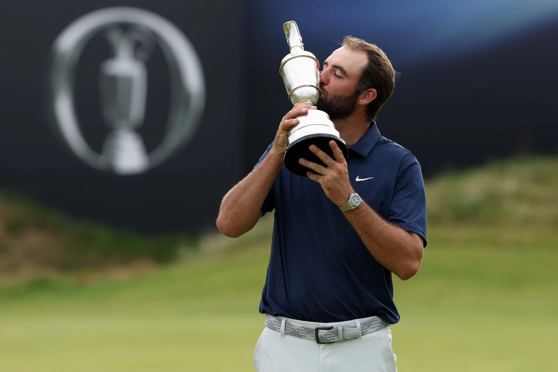 Scottie Scheffler kisses the Claret Jug after winning The 153rd Open at Royal Portrush.