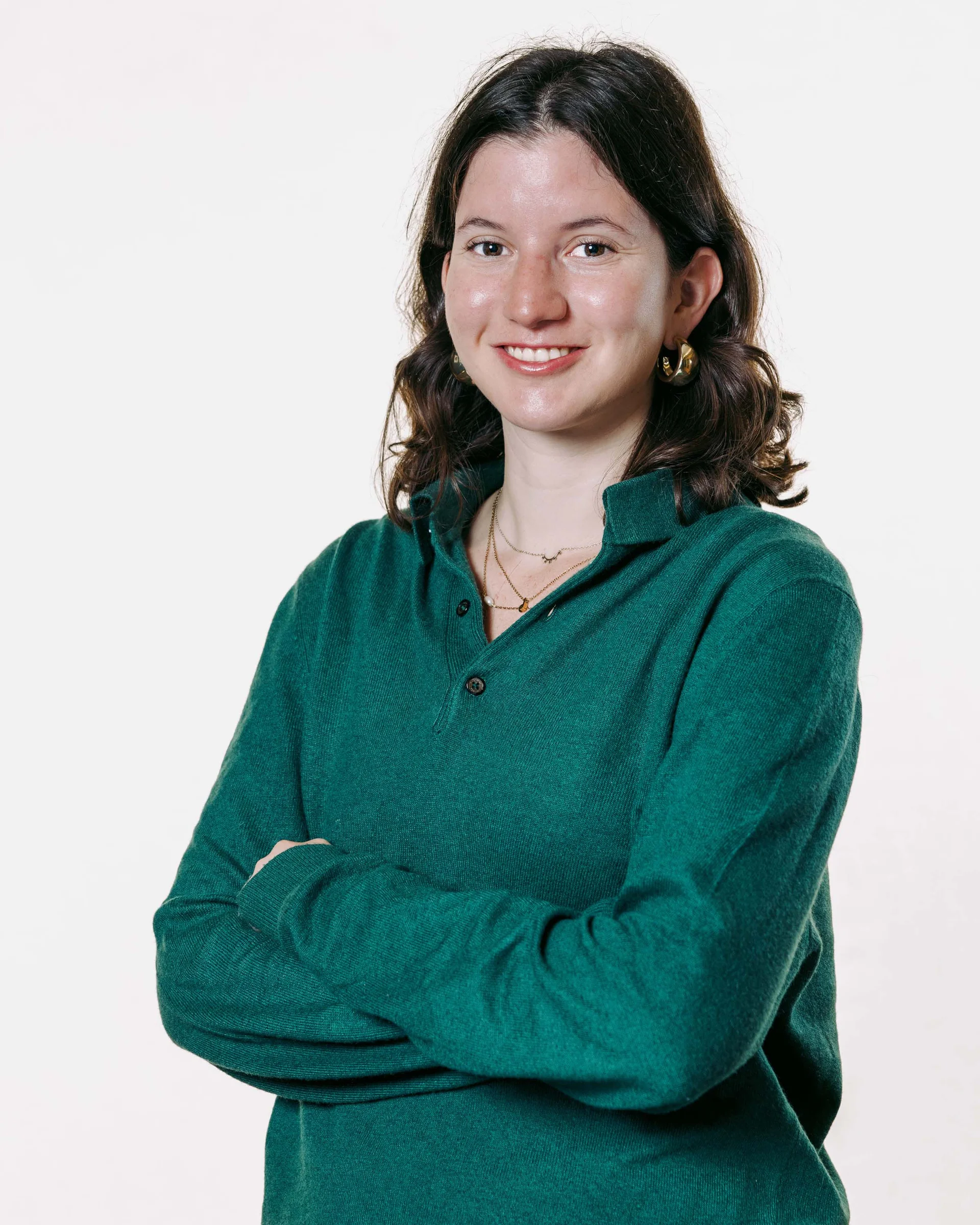 A professional portrait image of Lucia Juanas Crowe.