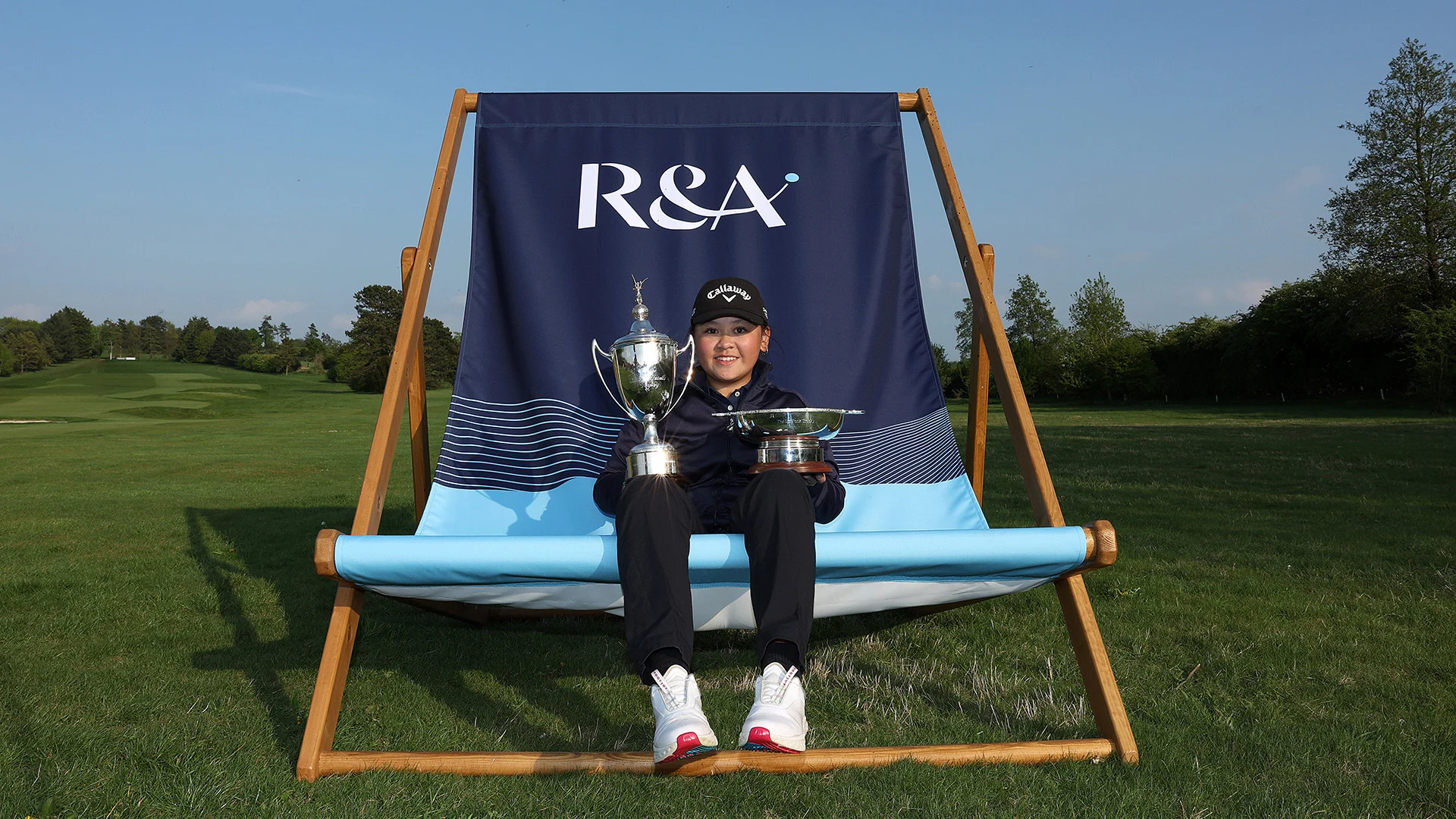 Sabrina Wong with her two trophies at the Girls' U16 Amateur