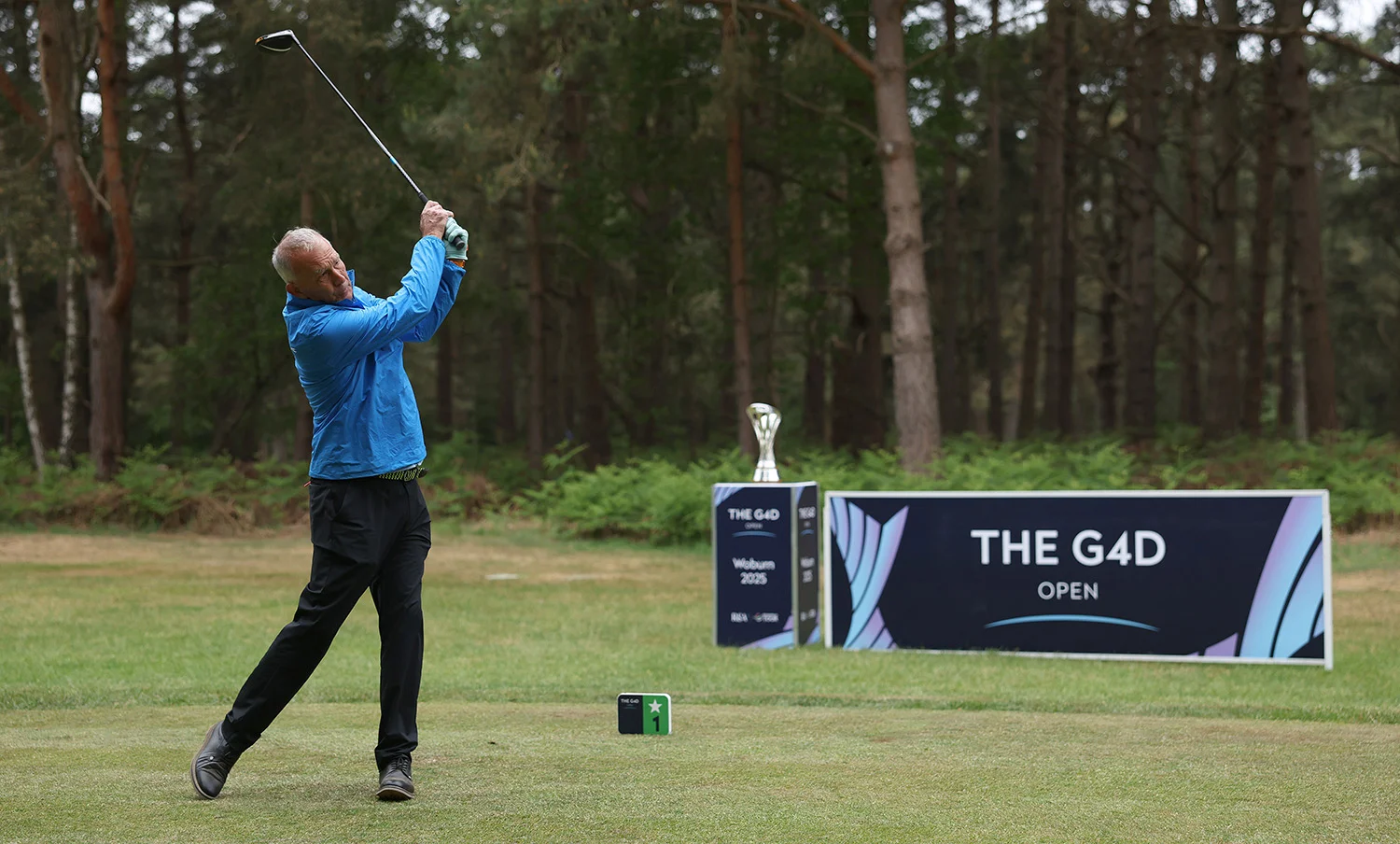 John Eakin plays a tee shot at The G4D Open at Woburn in 2025.