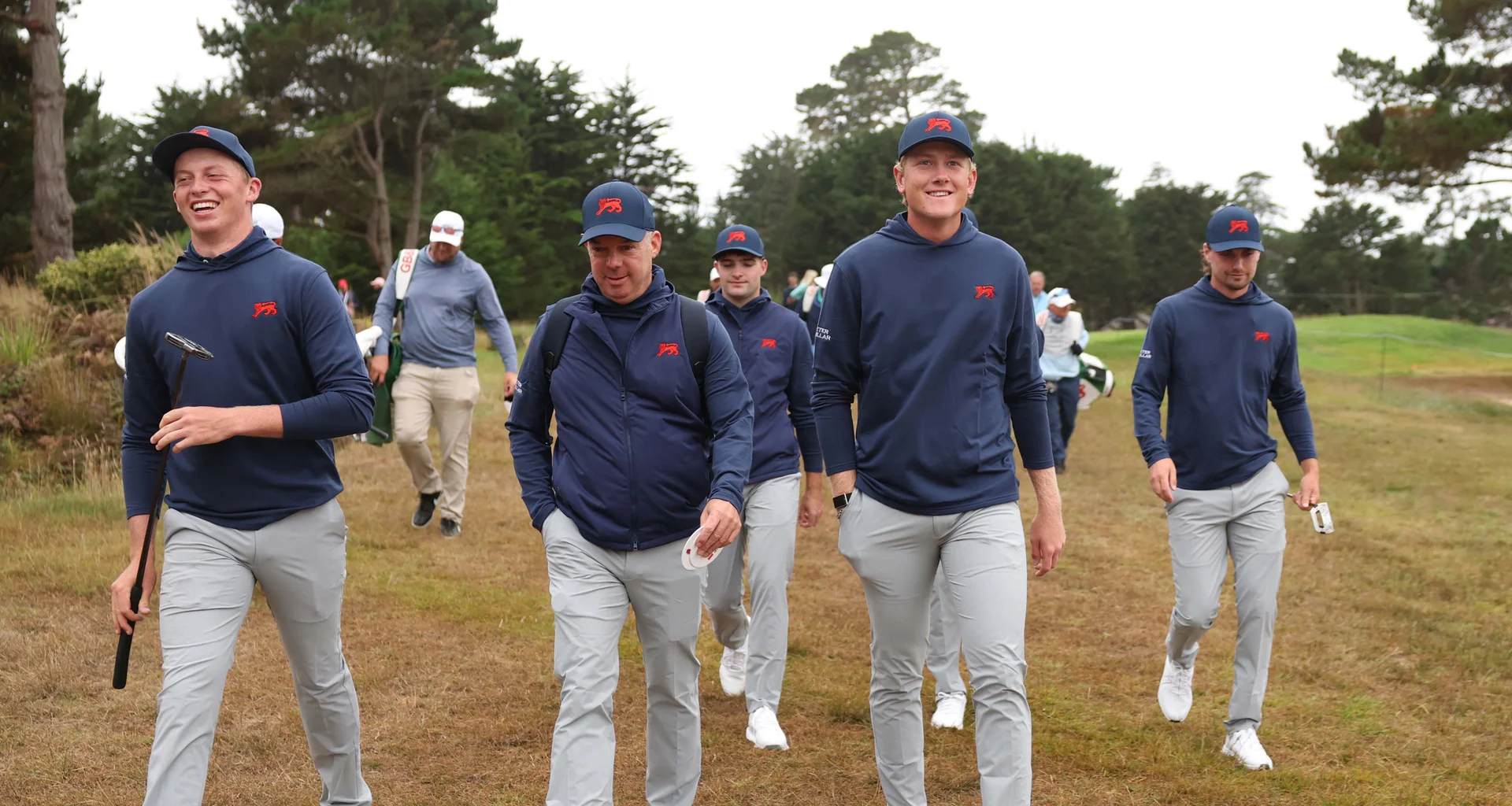 GB&I Walker Cup Captain Dean Robertson with Luke Poulter and Niall Shiels Donegan during the 2025 Walker Cup at Cypress Point.