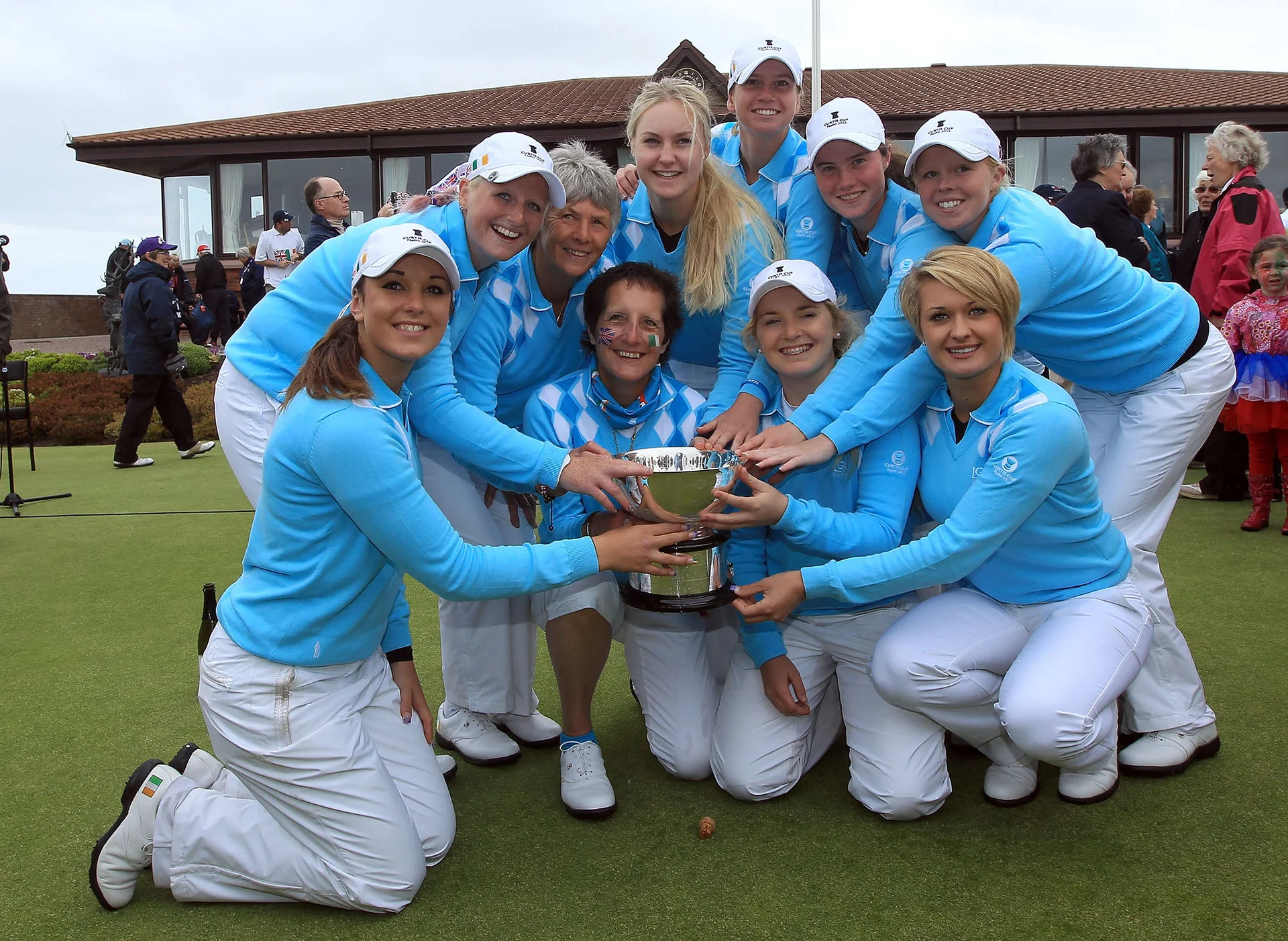 The victorious Great Britain and Ireland team with the Curtis Cup after their ten and a half to nine and a half win during the final day singles matches in the 37th Curtis Cup Match held at Nairn Golf Club on June 10, 2012