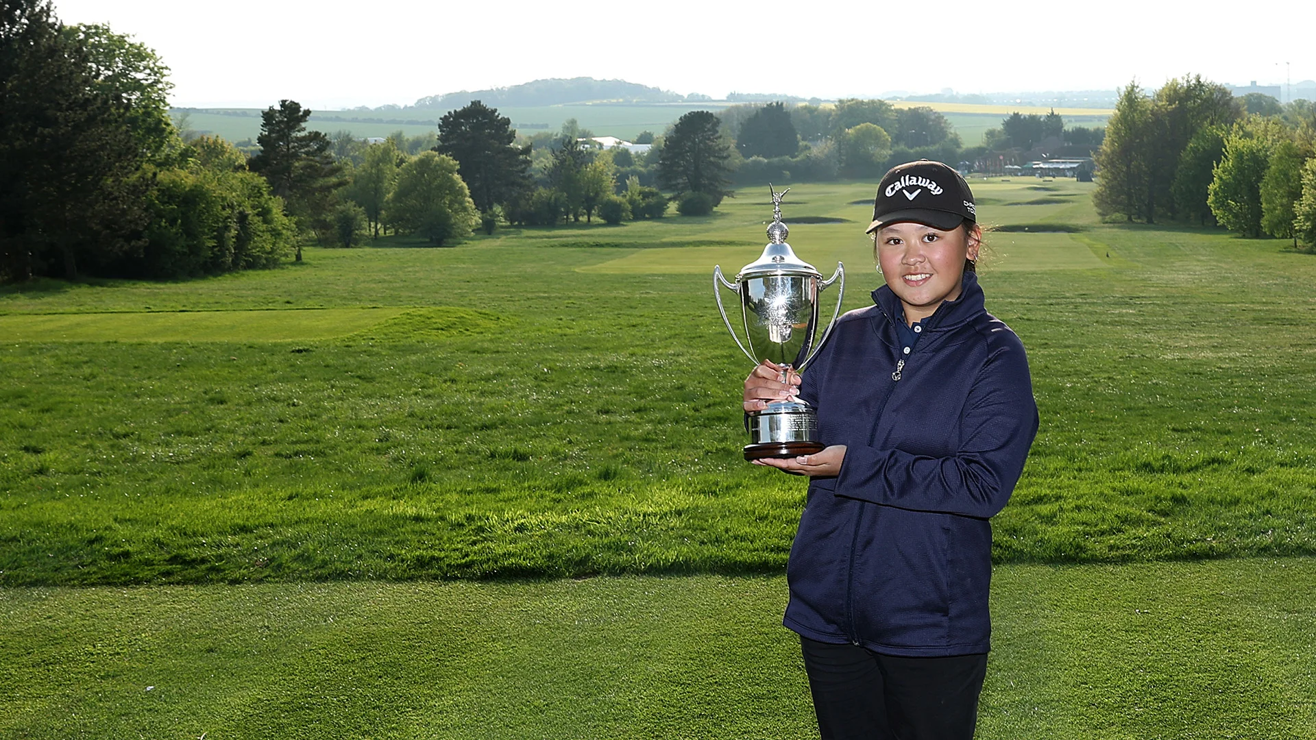 Sabrina Wong with the Girls' U16 Amateur trophy