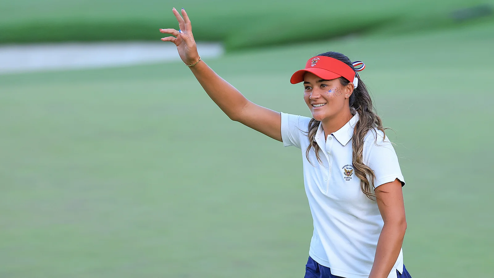 Kiara Romero celebrates her singles win at the 44th Curtis Cup