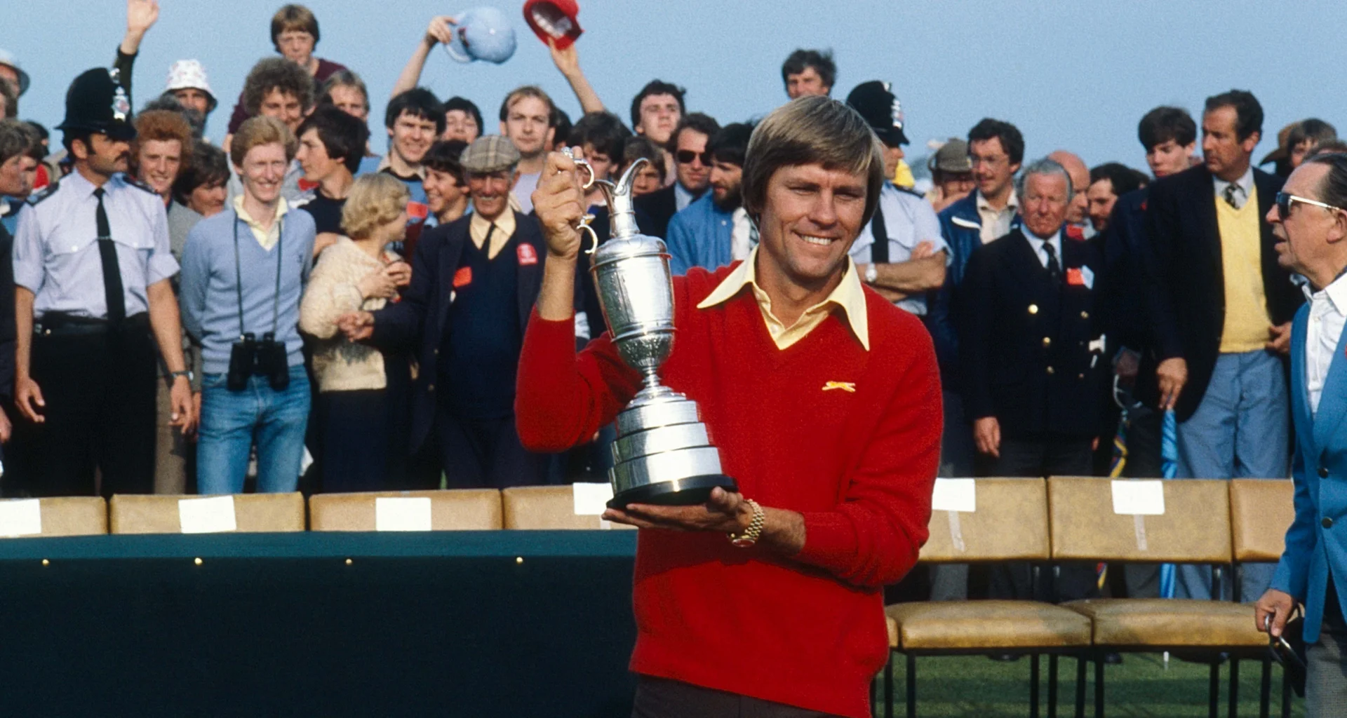 Bill Rogers celebrates with the Claret Jug after winning The Open at Royal St George's.
