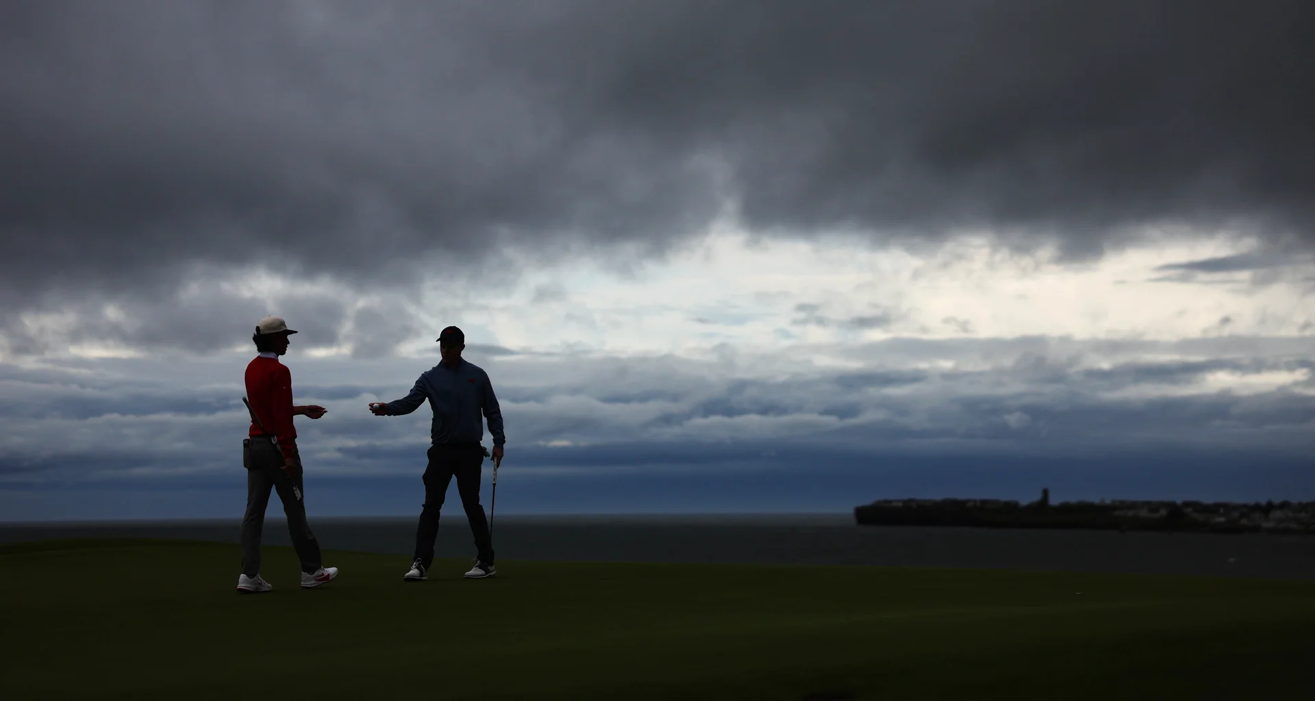 Stuart Grehan of Great Britain & Ireland reacts to Ethan Fang of the United States during the Sunday Foursomes on Day Two of the Walker Cup at Lahinch.