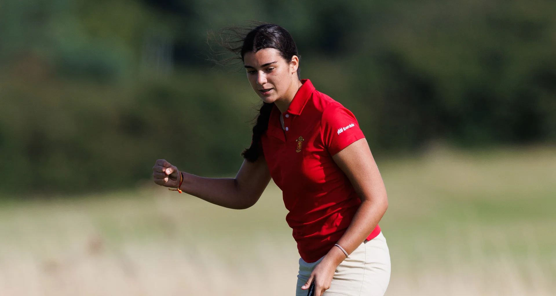Marta Munoz of Spain celebrates after holing her putt to win her match and reach the final during Day Five of the R&A Girls' Amateur Championship at Craigielaw.