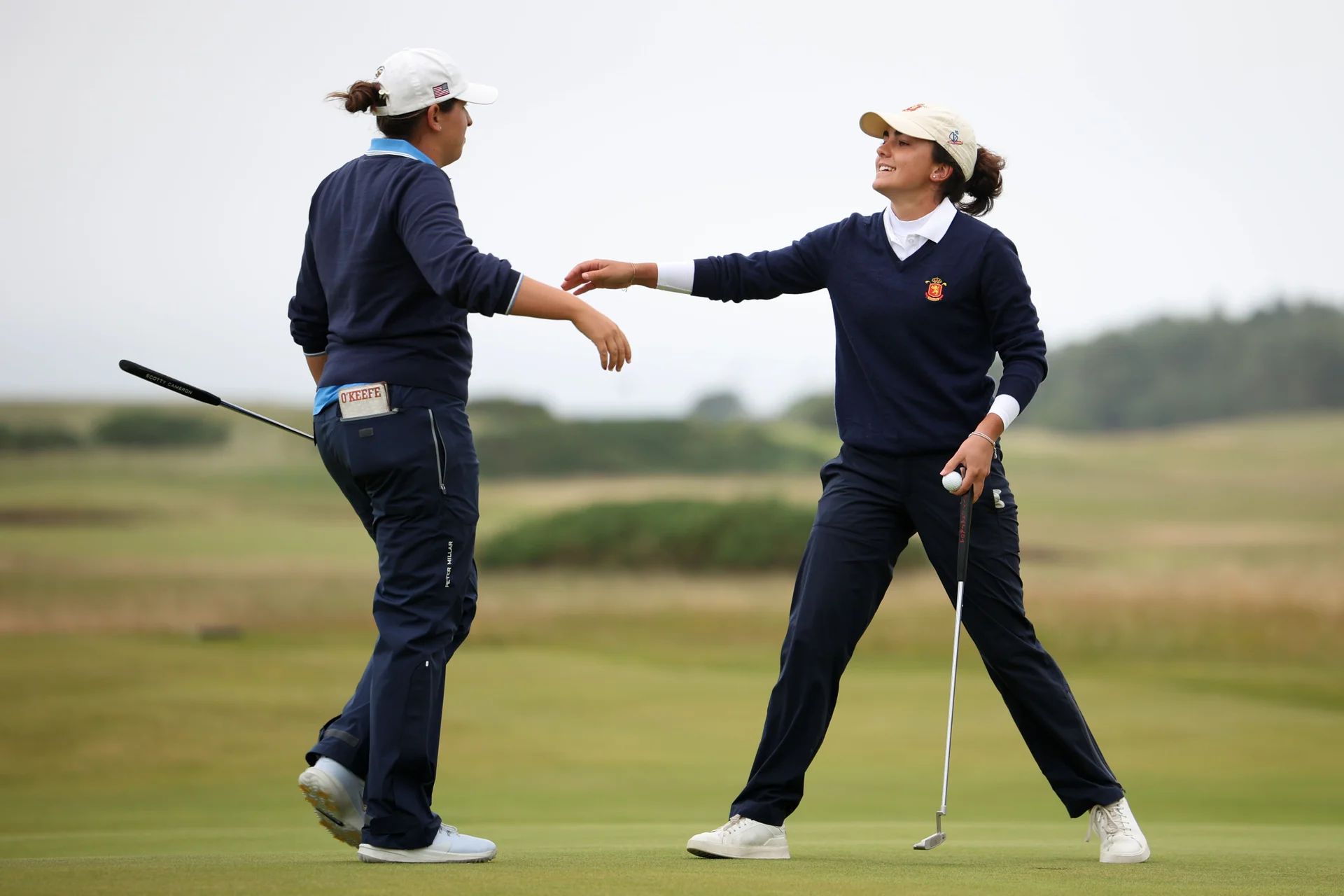 Andrea Revuelta of Spain reacts to Farah O'Keefe of USA after her victory during the Semi Finals of the 2026 Women's Amateur Championship at Muirfield.